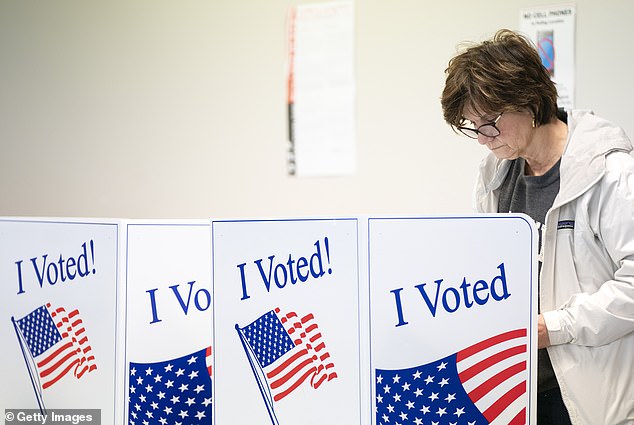 A South Carolina voter participates in early voting Thursday in Columbia, South Carolina.