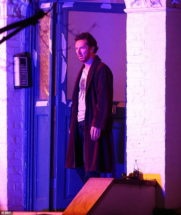 With a scruffy haircut and an untrimmed beard, Benedict appears surprised when he stands at the door of his house.