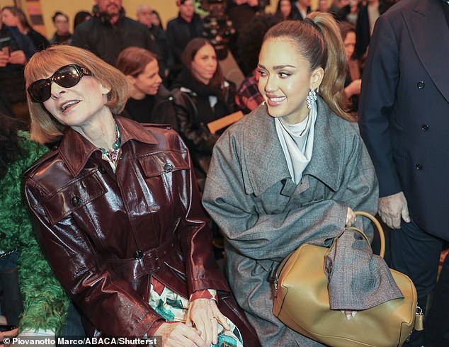 The beauty also got a front row seat next to fashion icon Anna Wintour, who donned a deep red leather trench coat, a floral dress and a pair of oversized Chanel opaque sunglasses.