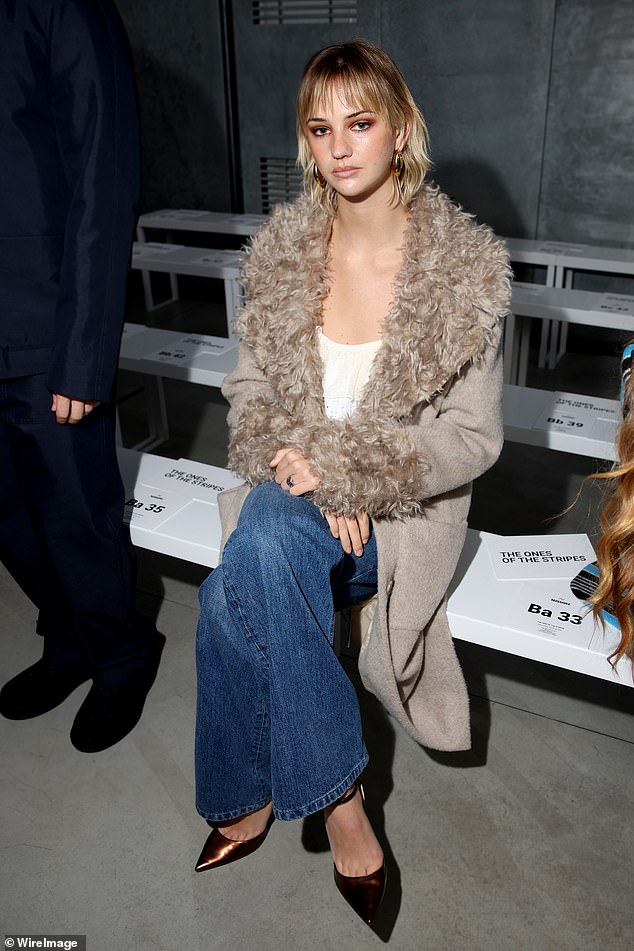 She was joined at the show by Mia Regan, who opted for an elegant but casual look while sitting in the front row.