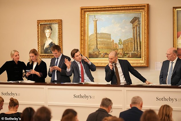 Sotheby's finally determined the work was a real Rembrandt at its auction in December (pictured) last year, as the price soared to $13.8 million just two years after the last sale.