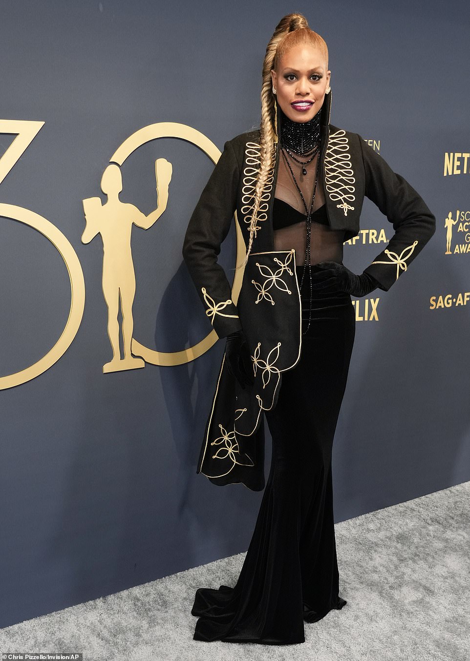 Laverne Cox was one of the first SAG Awards guests to get the fashion wrong, choosing to prioritize scandal over the overall bra-baring style.