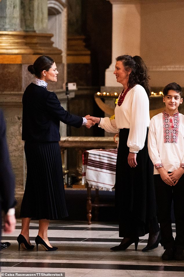 The royal, 46, looked solemn as she entered the Royal Chapel in Stockholm with King Carl Gustav, Queen Silvia and her husband Prince Daniel.