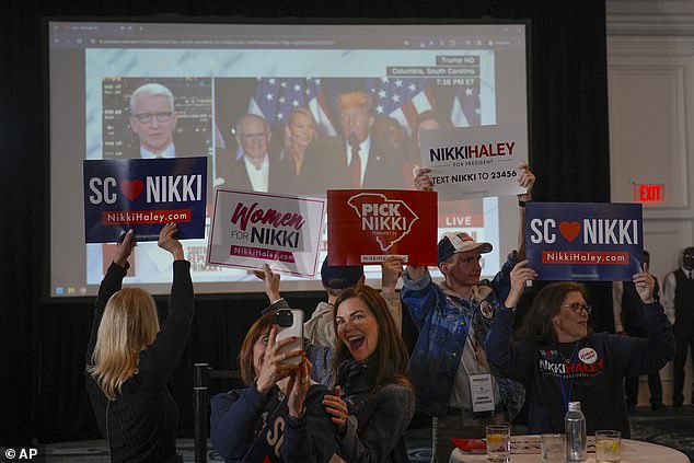 Supporters of the former U.N. ambassador danced in front of the jumbotron as former President Donald Trump touted his victory in Haley's home state.