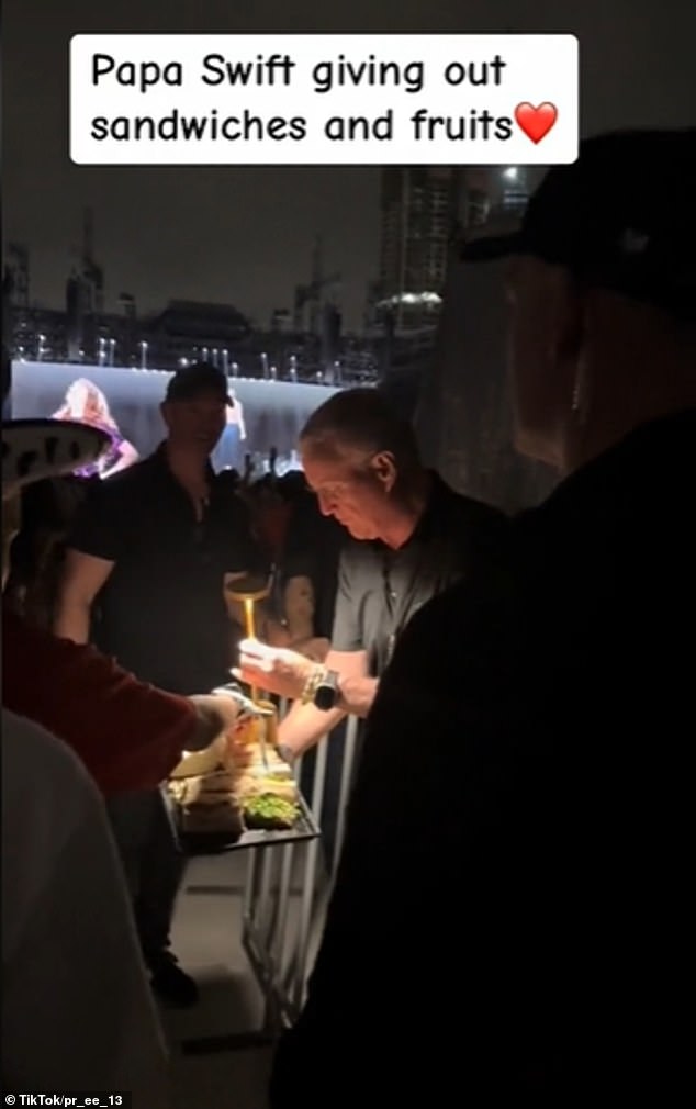 In a video shared on TikTok by a concertgoer, Scott can be seen in the back of the venue handing out snacks to hungry fans during a break in the show.