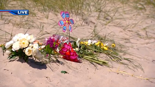 People have left tributes to the seven-year-old boy on the beach in Fort Lauderdale.
