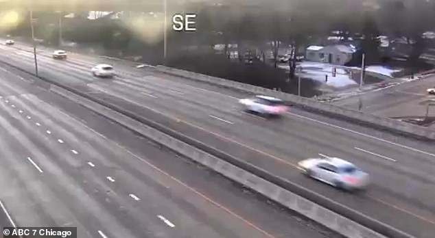 In the end, the robbers are seen being chased at high speed by police on Interstate 94.