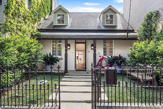 Situated on one of Paddington's most sought-after streets, this two-storey antique stone house is an elegant blend of Old World charm with modern luxury.