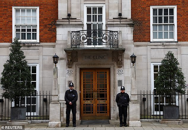 Two police officers stand guard outside the London Clinic in Marylebone when the Princess of Wales was a patient last month.