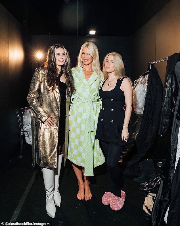 Clementine Vaughn (right) will appear in the latest issue of Vogue, 19 years after she first appeared as a baby in the arms of her mother, supermodel Claudia Schiffer (center).