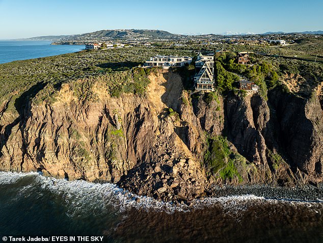 The historic storms that flooded the Golden State earlier this month caused a landslide that put three mansions in Dana Point at risk of falling into the Pacific Ocean.