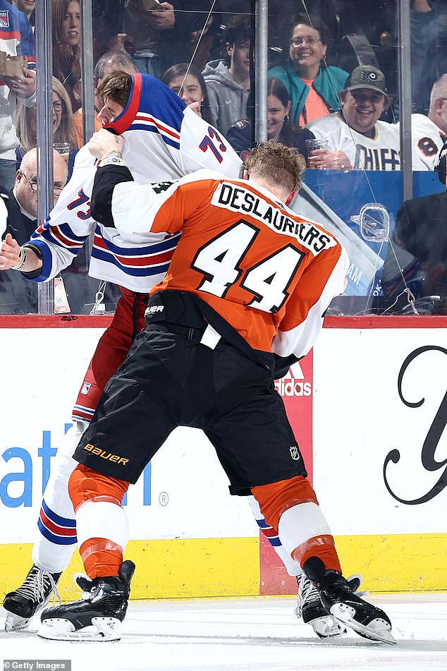 Deslauriers pulls Remp's shirt over his head before scoring a takedown in the epic fight.
