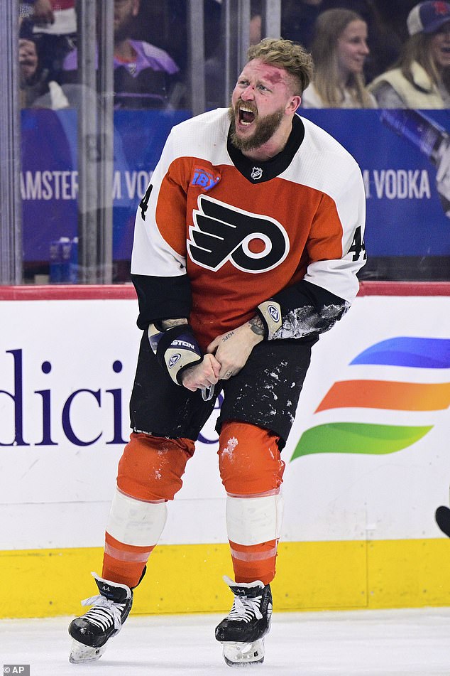 The Flyers' Nicolas Deslauriers, slightly disfigured, reacts after Saturday's first-period brawl.