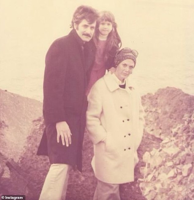 Last year, Jennifer opened up more about the impact of her childhood on her love life, admitting that her romantic relationships have been negatively affected by her parents' bitter separation (pictured with her mother Nancy Dow and father John Aniston) .