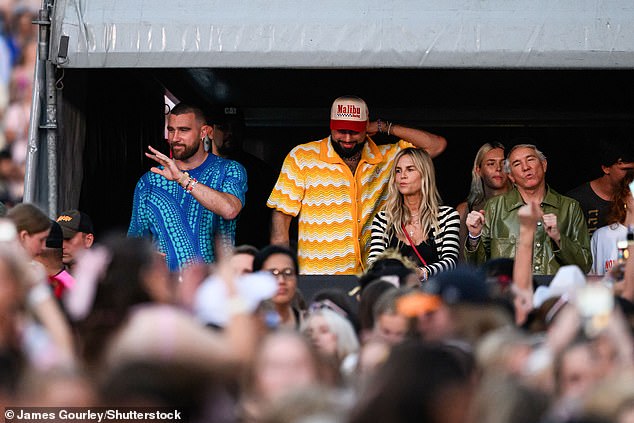 Baz was spotted at Taylor Swift's concert in Sydney on Friday night in the singer's star-studded box alongside her NRL star boyfriend Travis Kelce, Katy Perry and fellow filmmaker Taika Waititi and his wife Rita Ora .