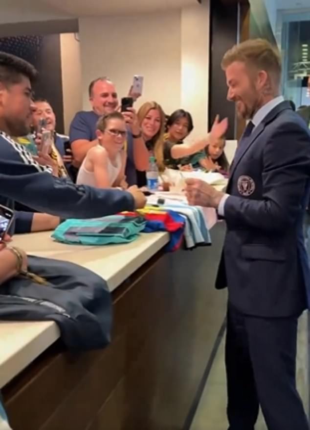 Beckham was seen signing autographs before his Miami team took on the Galaxy in Los Angeles.