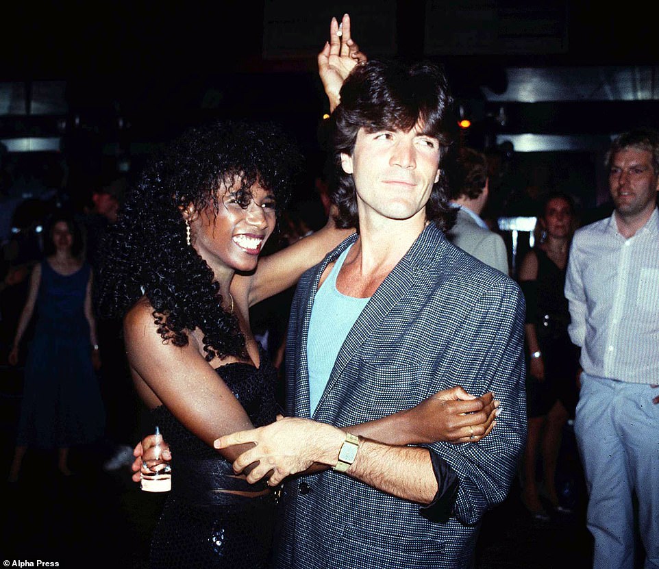 1985: Cowell's elegant features caught the eye during a night out with his girlfriend Sinitta at London's Legends nightclub.