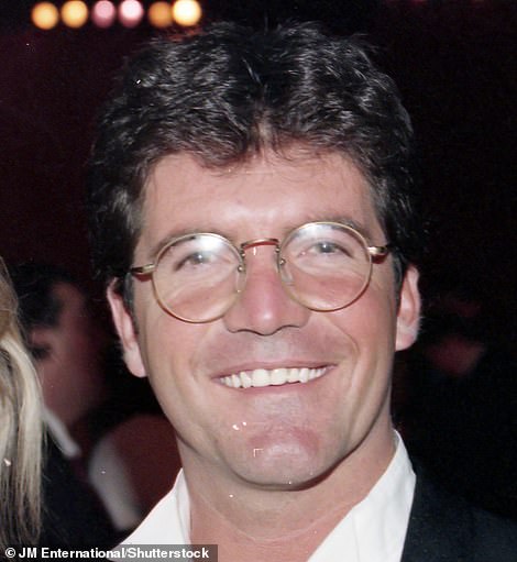 1994: Cowell modeled a pair of circular glasses at the 1994 BRIT Awards.