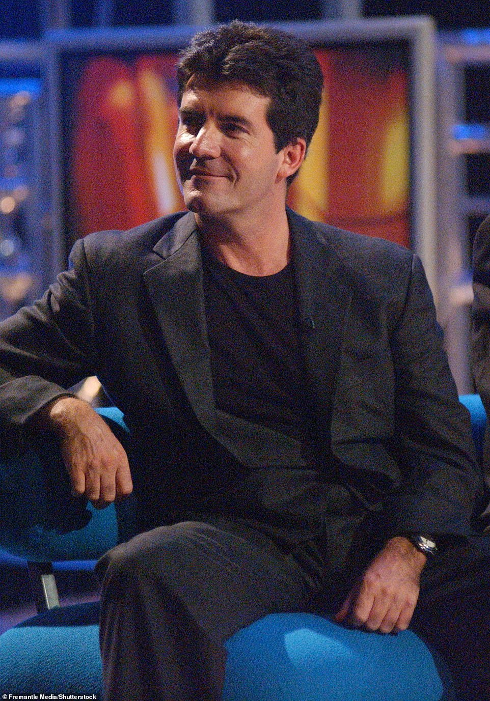 2001: Cowell looks dapper on Pop Idol, a prototype for The X Factor and the show that helped establish him as a household name.