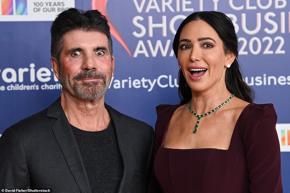 2022: The music mogul turned heads during his appearance at the Variety Club Showbusiness Awards in November, where he was accompanied by his glamorous partner Lauren Silverman.