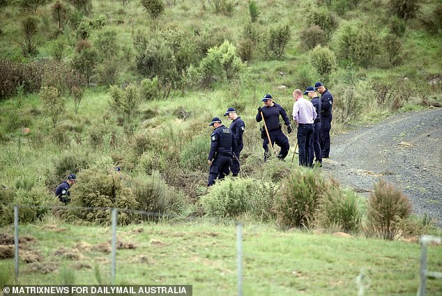 Police were seen searching several dams and bushland on the remote property (pictured).