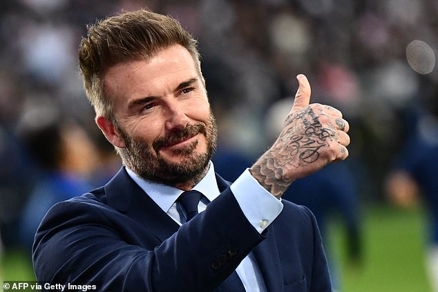 Former LA Galaxy player David Beckham, now co-owner of Inter Miami, waves to the crowd