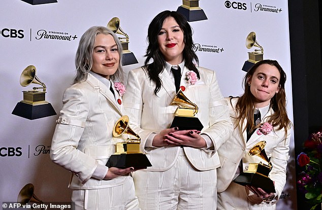 Boygenius wore white suits and matching black ties to the Grammy Awards.  From left to right: Phoebe Bridgers, Lucy Dacus and Julien Baker