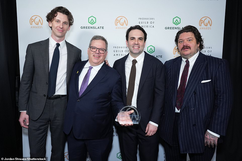 Chef Matty Matheson (right), who appears on Bear and serves as a producer and culinary consultant, was joined on stage by his fellow producers to accept the honor.