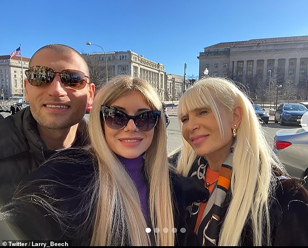 Diana Lavrenyuk (right) poses with her son Nikolay and another woman