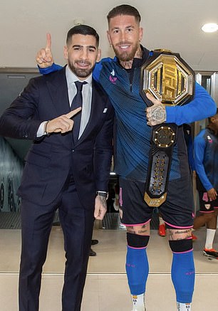Former Madrid captain Sergio Ramos had a big smile next to the featherweight champion.