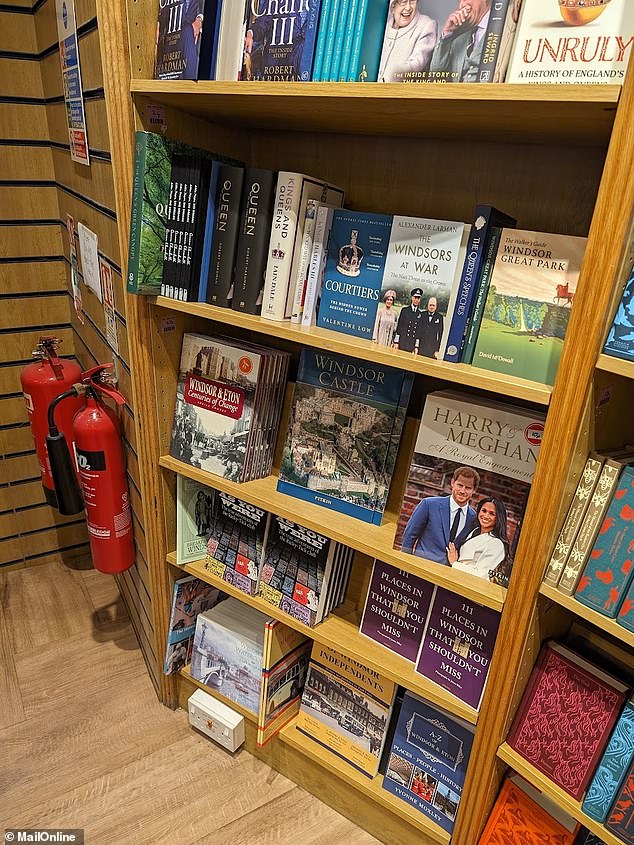 The book is surrounded by other full-price royal titles at Waterstones in Windsor.