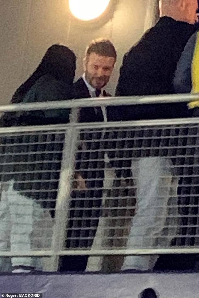 The 48-year-old Inter Miami owner looked dapper in a navy suit with his team's badge on the pocket, which he paired with a pale blue shirt and tie.