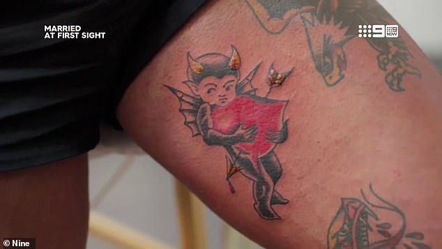 Just hours after being criticized by experts, the couple took the very bold step of getting matching tattoos of a devilish cherub holding a heart.