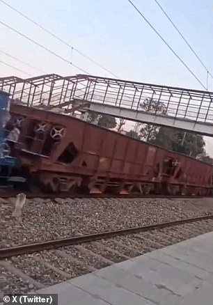 A video on social media, taken by a bystander, shows the runaway freight train speeding through a station.
