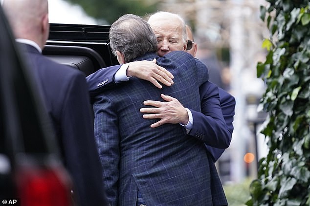 President Biden has privately expressed concern that the daily attacks could take a toll on his family and even cause his son to relapse. Pictured: Joe and Hunter Biden hug after their first child's birthday dinner at The Ivy in Los Angeles, California on February 4, 2024.