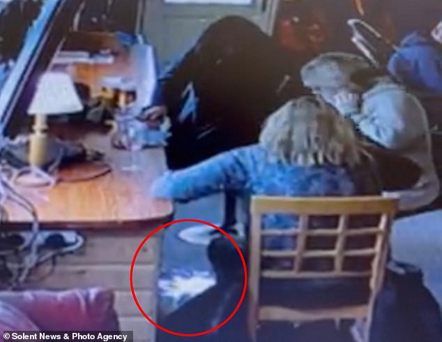 Bizarre images taken from inside the pub show pints of beer slowly sliding down the side of the table without being touched or moved.