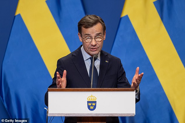 Swedish Prime Minister Ulf Kristersson speaks during a news conference with his Hungarian counterpart, Prime Minister Viktor Orban, during a news conference following their meeting in Budapest, Hungary, on Friday.