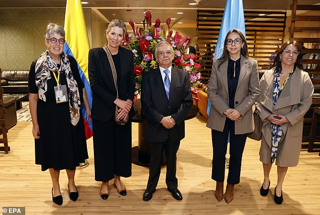 The royal, 52, arrived yesterday in Medellín, Colombia, to promote financial inclusion and innovation as part of her role as special advisor to the UN (pictured: Queen Máxima with the ambassador of the Netherlands to Colombia Reina Buijs (left), the Colombian ambassador to the Netherlands Carolina Olarte (second right) and the UN Resident Coordinator in Colombia Mireia Villar Forner (right)
