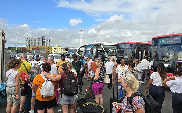 Hundreds of tourists were unable to board the ship and were forced to queue at the port before being accommodated in hotels.