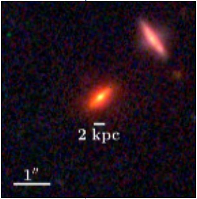 A close-up image of ZF-UDS-7329 shows its enormous size. The scale bar indicates 2 kiloparsecs, or 6,530 light years.