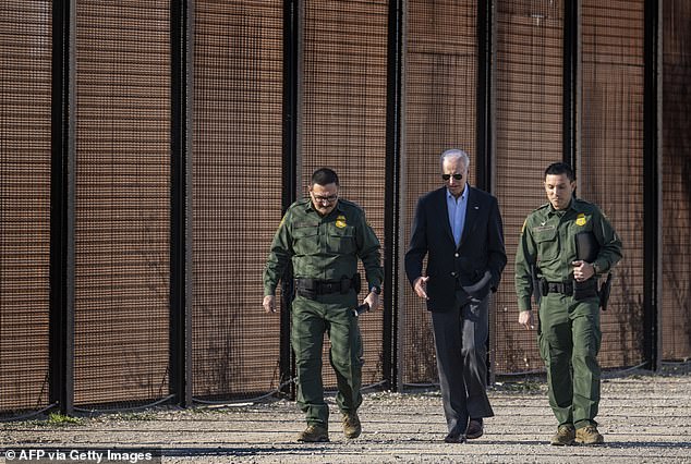 US President Joe Biden speaks with US Customs and Border Protection officials while visiting the US-Mexico border in El Paso, Texas.