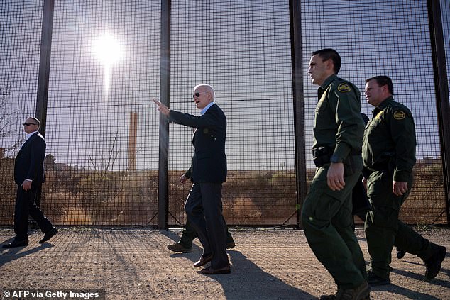 US President Joe Biden walks along the US-Mexico border fence in El Paso, Texas, on January 8, 2023.