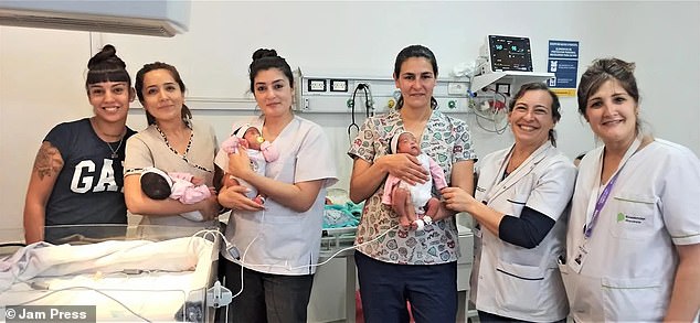Pictured above is mother Melany (far left) and hospital staff with her three babies.  They were on oxygen for a few weeks before they were allowed to return home.