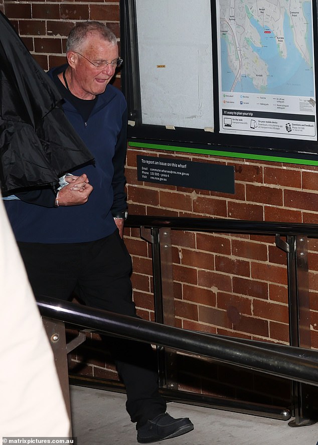 Scott Swift is pictured holding Taylor's hand at the Neutral Bay pier on Sydney's north shore at around 3am on Tuesday.