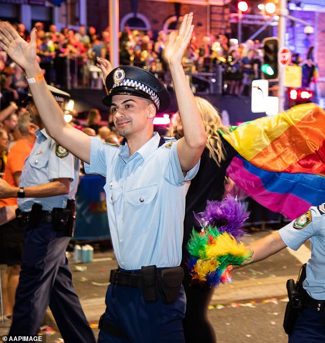 Lamarre-Condon is behind bars and will be questioned again on Tuesday.  The top agent previously marched in uniform at Mardi Gras in 2020 (pictured)