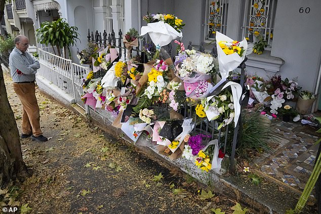 Floral tributes from friends, family and well-wishers adorn the outside porch of Jesse Baird's Paddington home