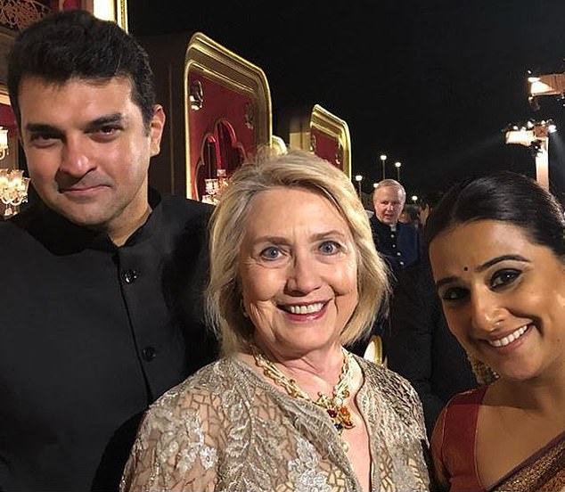 Former first lady of the United States Hillary Clinton was seen posing with guests at Isha Ambani's wedding in 2018.