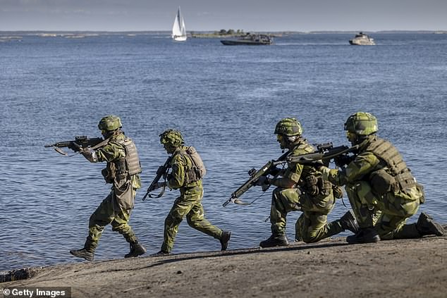 Swedish and Finnish soldiers conduct war simulation exercises during NATO's Baltic Operations (Baltops 22) military exercises on June 11, 2022.