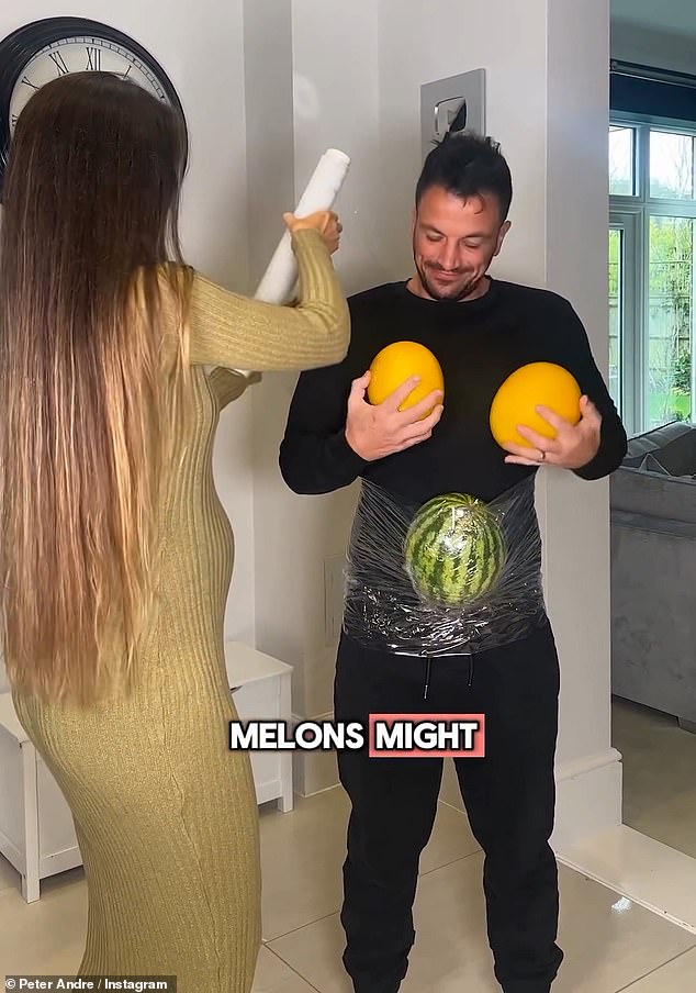 Emily helped him tie the melons while helping him put plastic wrap over the fruit to secure it.