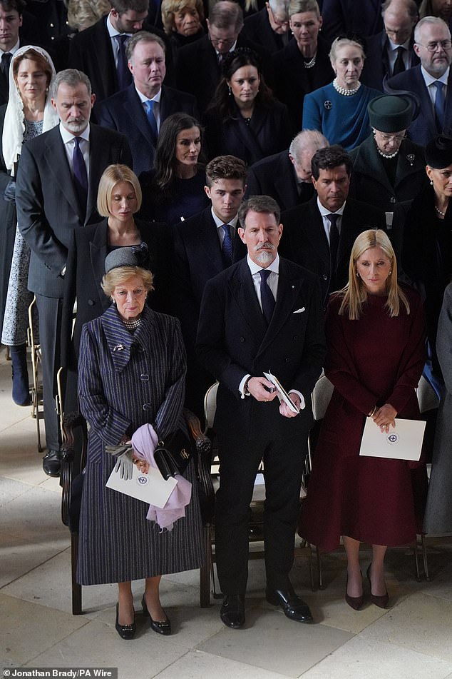 Pictured: Left to right: Queen Anne Mary of the Hellenes, Crown Prince Pavlos of Greece and Crown Princess Marie-Chantal of Greece attend a service of thanksgiving for the life of King Constantine of the Hellenes in St. George's Chapel, Windsor Castle.